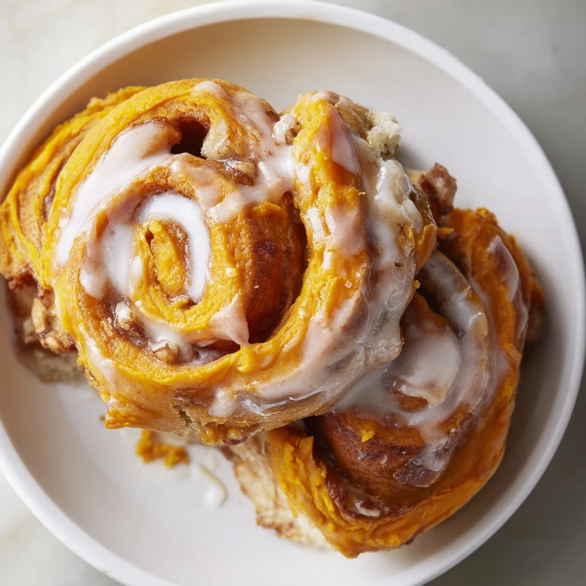 Festive Thanksgiving Sweet Potato Cinnamon Roll Dessert with warm spices and buttery goodness.  