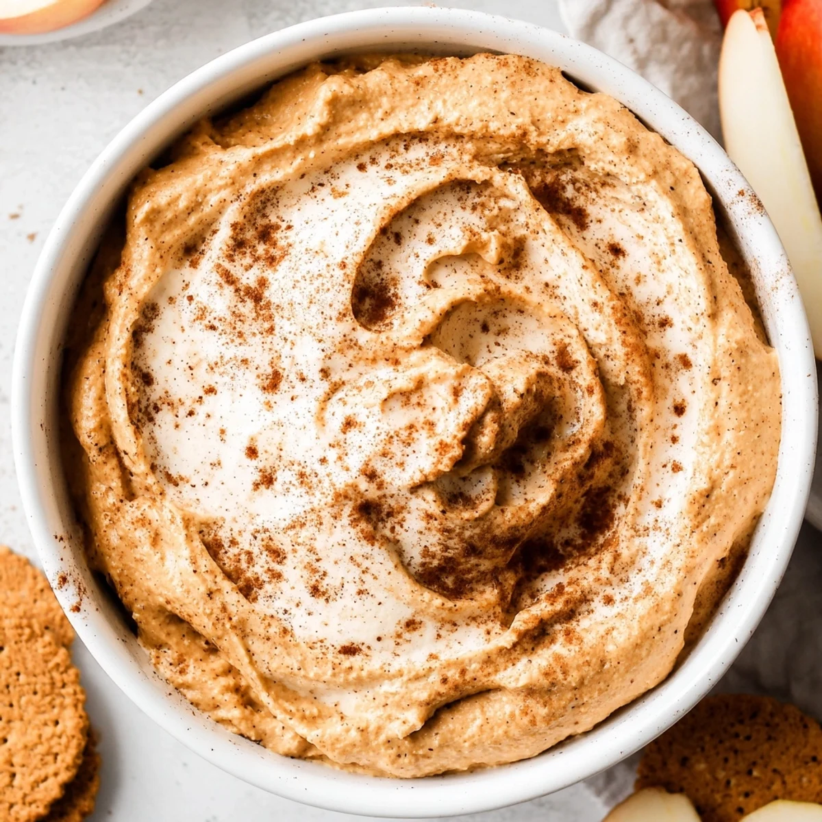 Fluffy pumpkin coffee whip dip featuring autumn spices, ideal with graham crackers.