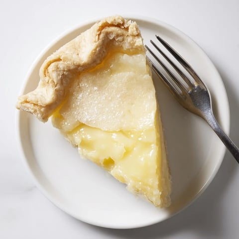 Creamy water pie with golden crust, a nostalgic Great Depression dessert.  