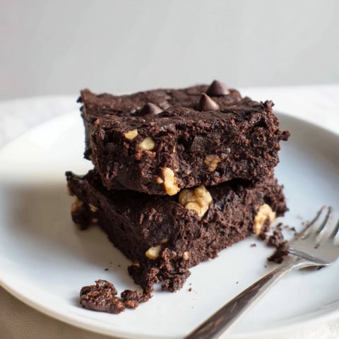 Fudgy Zero-Waste Brownies using nut-milk pulp, topped with dark chocolate chips.  