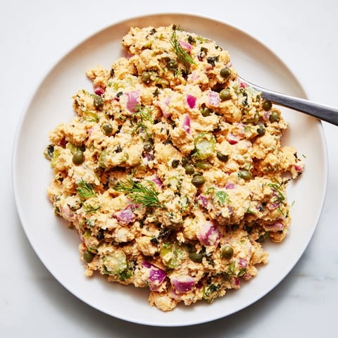 Creamy chickpea tuna salad, a vegan delight with chunky texture, perfect for sandwiches.