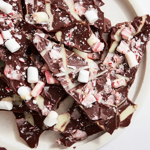 Festive Hot Chocolate Bomb Bark with marshmallows and peppermint, ready for holiday gifting.