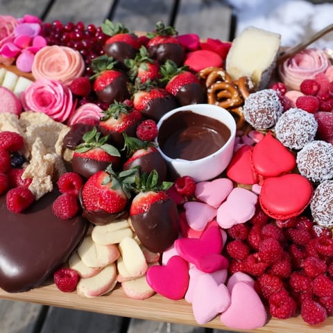 Delicious Sweetheart Valentines Day Board laden with chocolate-covered strawberries, perfect for sharing.