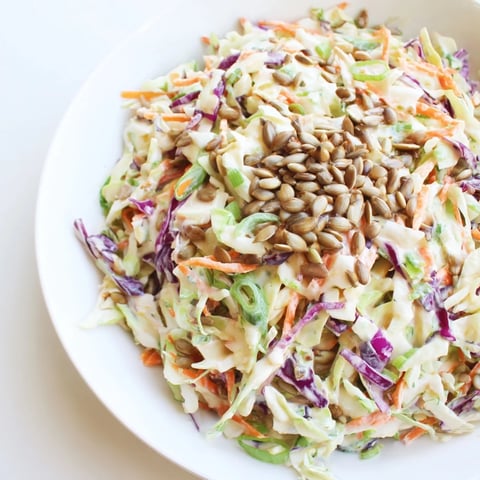 Crisp Crunchy Coleslaw Salad, a colorful mix of shredded cabbage, carrots, and creamy dressing.