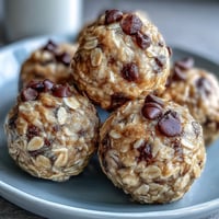 Photo of finished {{Snack-Sized Protein Balls with Peanut Butter and Oats}} ready to 